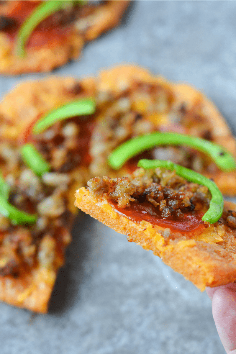 Better than Fat Head Pizza, this Low Carb Pizza fills you up at a fraction of the calories and carbs! The secret? Pork Rind Power! | heyketomama.com