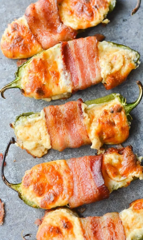 These Bacon Wrapped BBQ Jalapeno Poppers are an incredibly savory, flavorful low carb dish. Perfect to bring to any backyard BBQ, or to just enjoy at home! | heyketomama.com