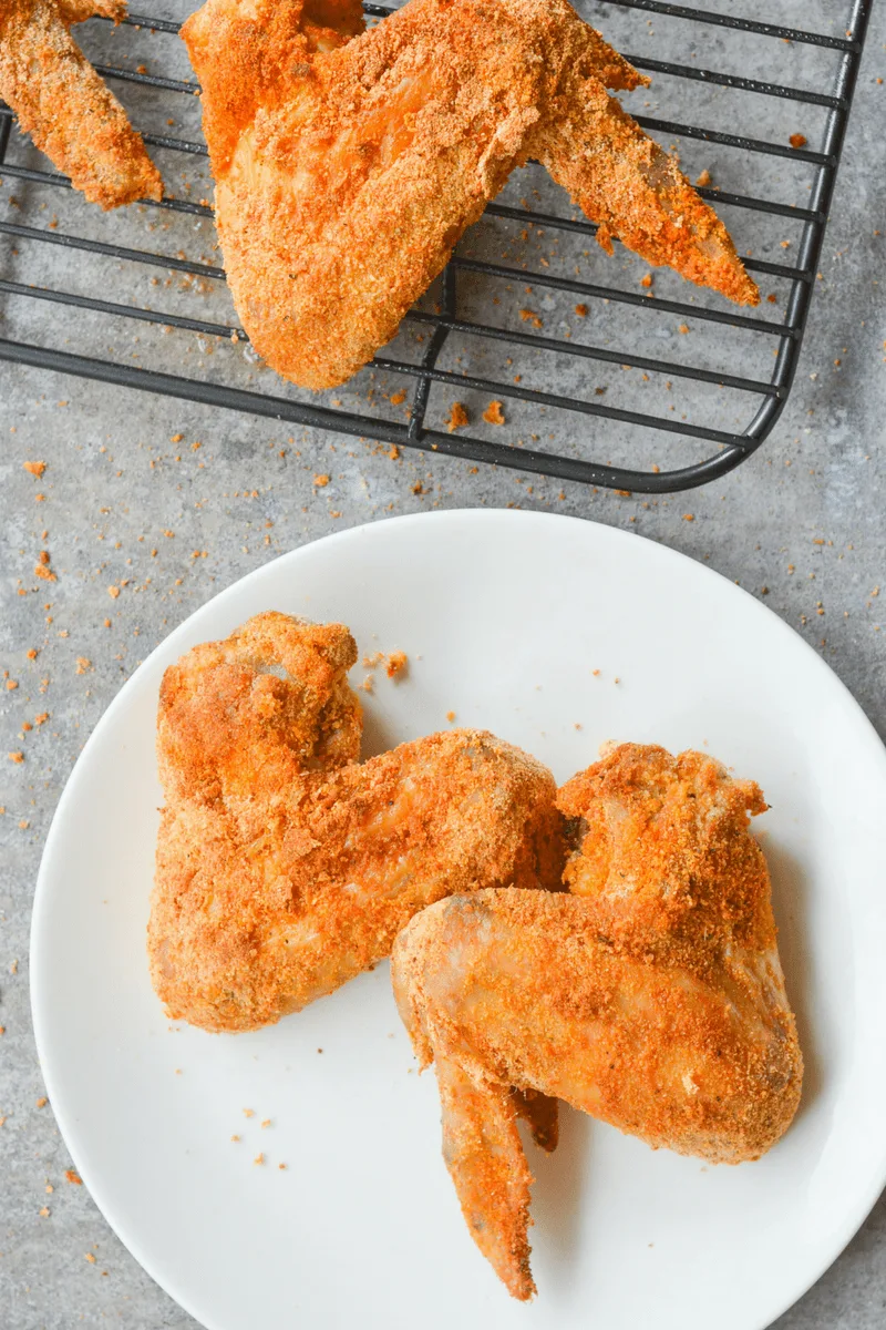 These Low Carb Crispy Oven Fried Wings are a delicious and healthy way to satisfy that fried chicken craving without the traditional flour! | heyketomama.com
