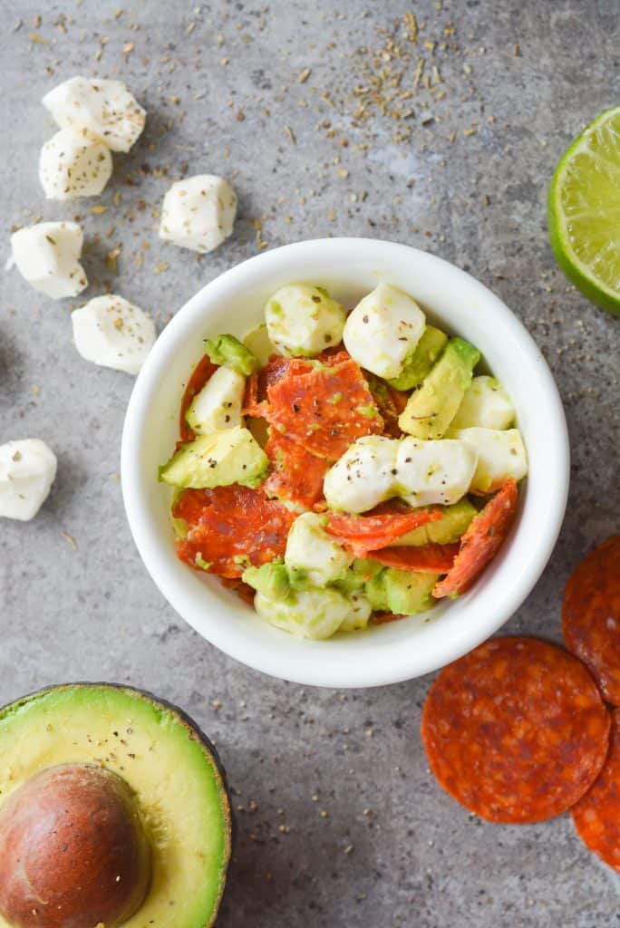 This Keto Avocado Pepperoni Salad is an easy, flavorful dish that takes just minutes to put together. It makes the perfect keto lunch! | heyketomama.com