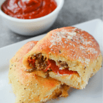 These Keto Fathead Pizza Pockets are delicious proof that going low carb does not mean giving up your favorite foods! | heyketomama.com