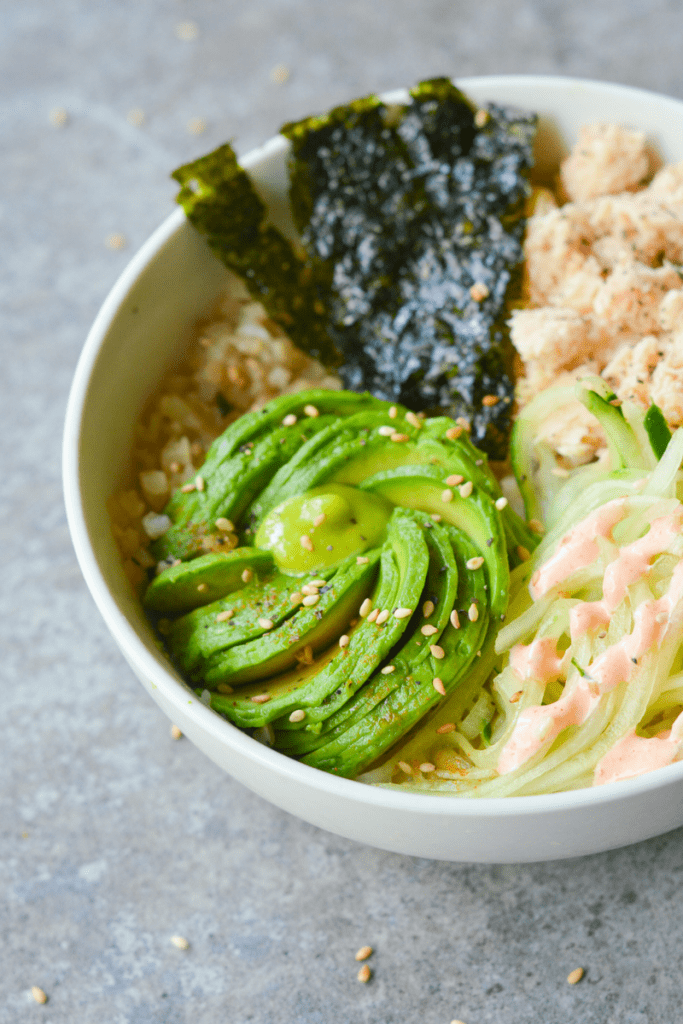 This Keto Salmon Sushi Bowl is a spicy low carb dish created to restore hope to all of the sushi lovers who have gone Keto. | heyketomama.com