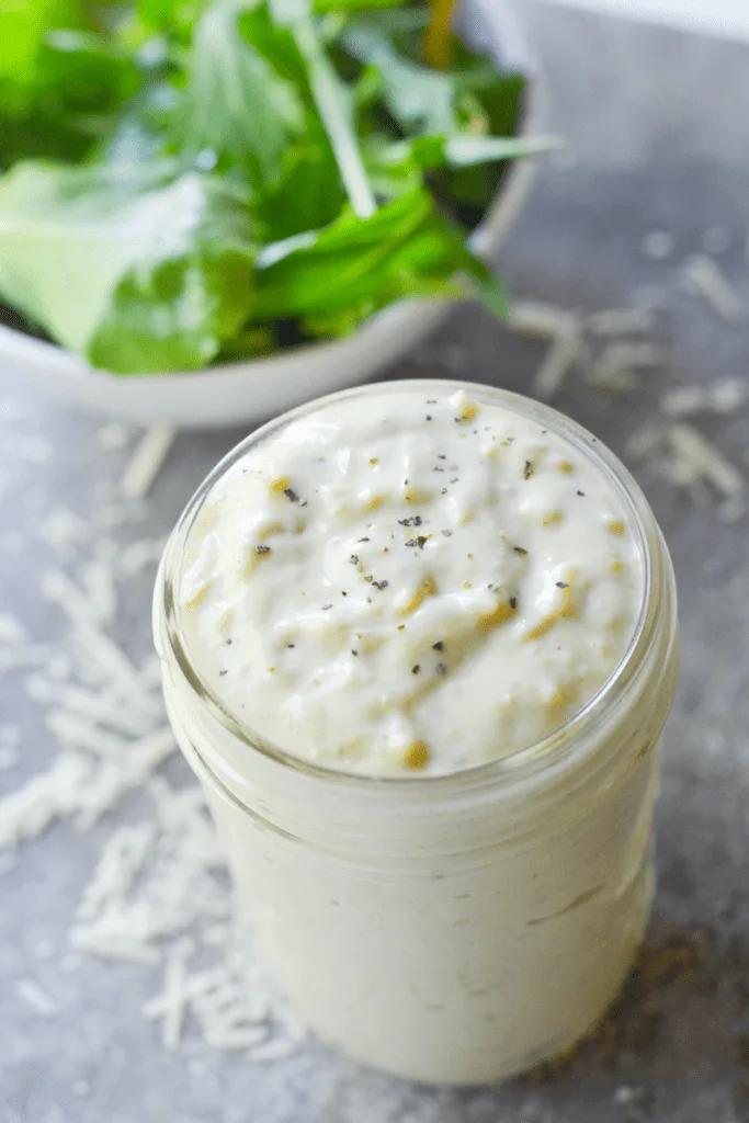 This Low Carb Garlic Avocado Caesar Dressing is a beautiful, quick, and easy way to dress any of your low carb salads! | heyketomama.com
