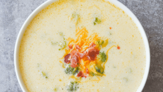This Keto Broccoli Cheddar Soup is so yummy and filling, you won't even miss the potatoes! It's an excellent low carb option for any Fall meal! | heyketomama.com