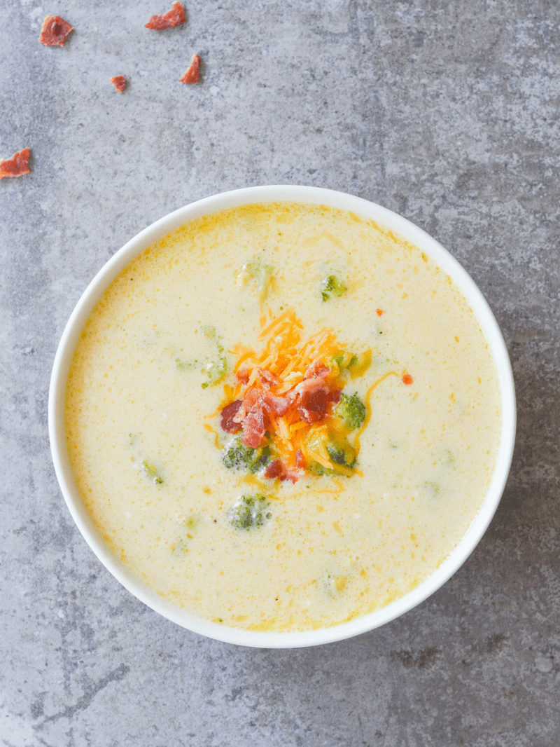 This Keto Broccoli Cheddar Soup is so yummy and filling, you won't even miss the potatoes! It's an excellent low carb option for any Fall meal! | heyketomama.com