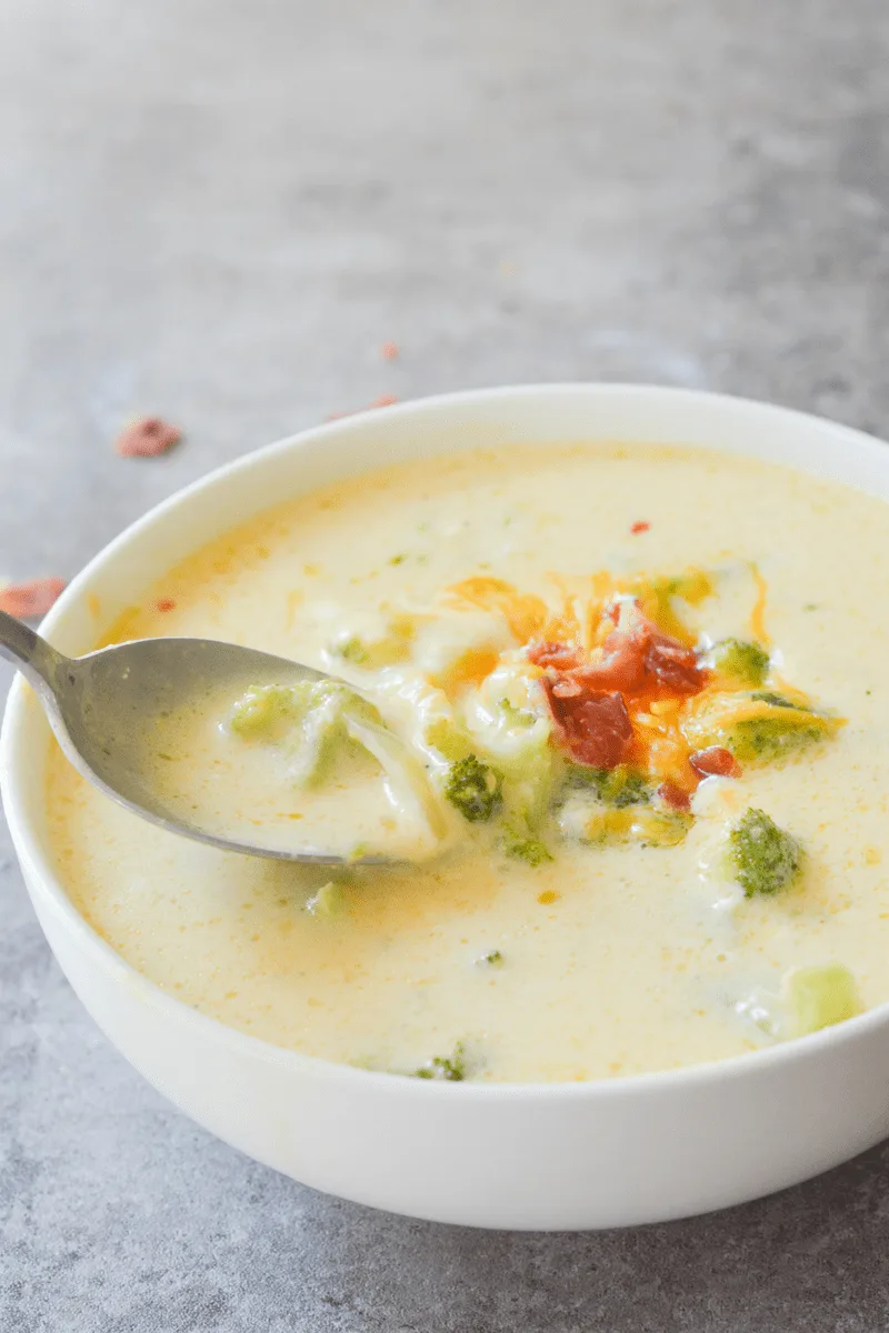 This Keto Broccoli Cheddar Soup is so yummy and filling, you won't even miss the potatoes! It's an excellent low carb option for any Fall meal! | heyketomama.com