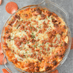 This Easy Keto Pizza Dip is a quick, warm, and savory recipe you can feel good about indulging in with low carb bread sticks, pork rinds, or just a fork! | heyketomama.com