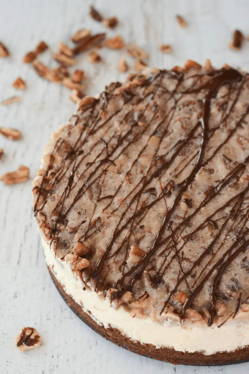 This Keto Pecan Pie Cheesecake is PERFECT for the Holiday Season. It's so delectable your non-low carb loved ones will never know the keto difference! | heyketomama.com