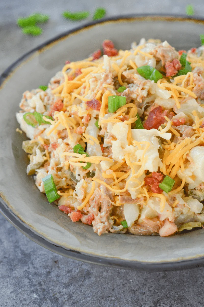 This loaded keto cauliflower bowl is a rich and flavorful, filling meal that will remind you of a baked potato!