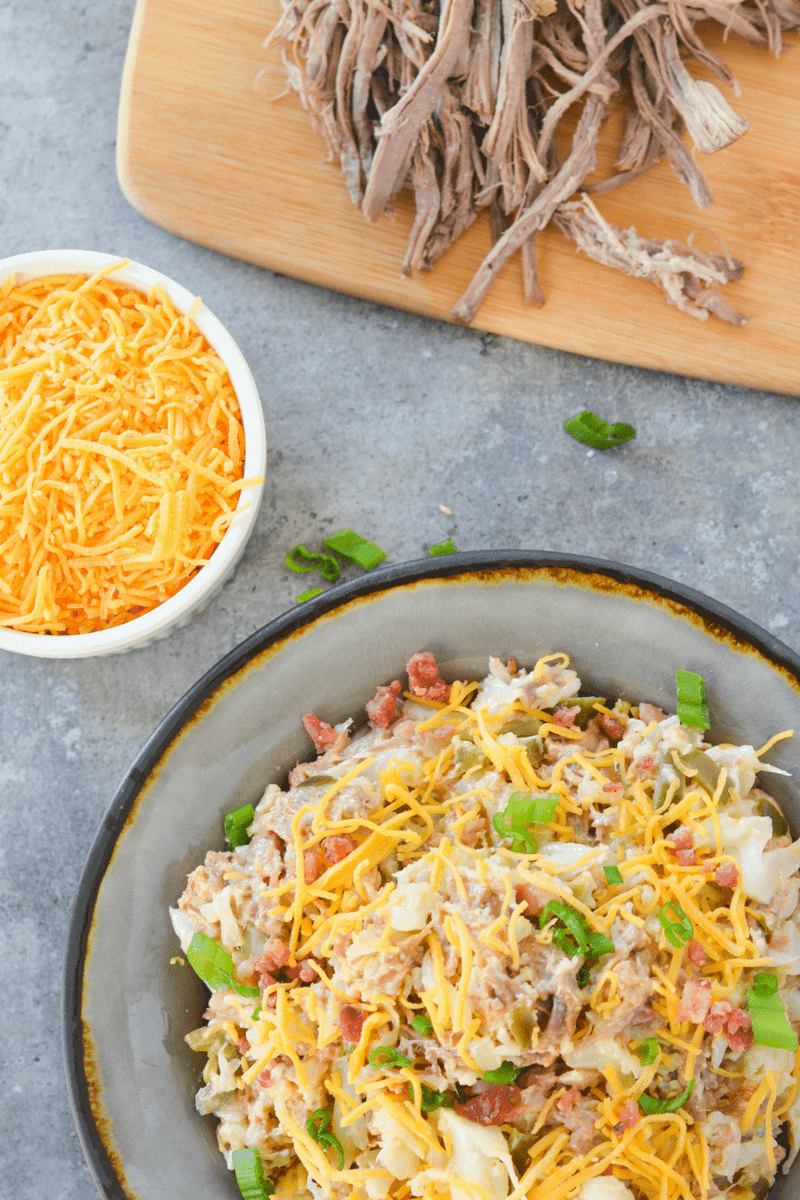 This loaded keto cauliflower bowl is a rich and flavorful, filling meal that will remind you of a baked potato!