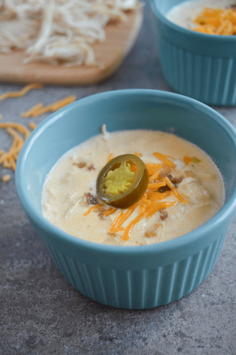 This Keto Jalapeno Popper Soup will soon become your family's favorite low carb comfort food. It's packed with savory flavor and just the right amount of kick. Be sure to make at least a double batch for leftovers! | heyketomama.com