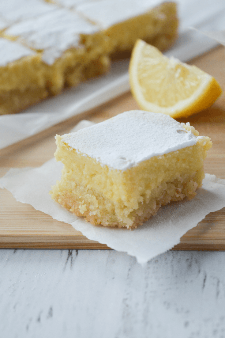 This recipe for keto lemon bars is an absolute low carb dream! With only 4g of net carbs per serving, you'll be happy to indulge in this bright and tangy treat without a shred of guilt! | heyketomama.com