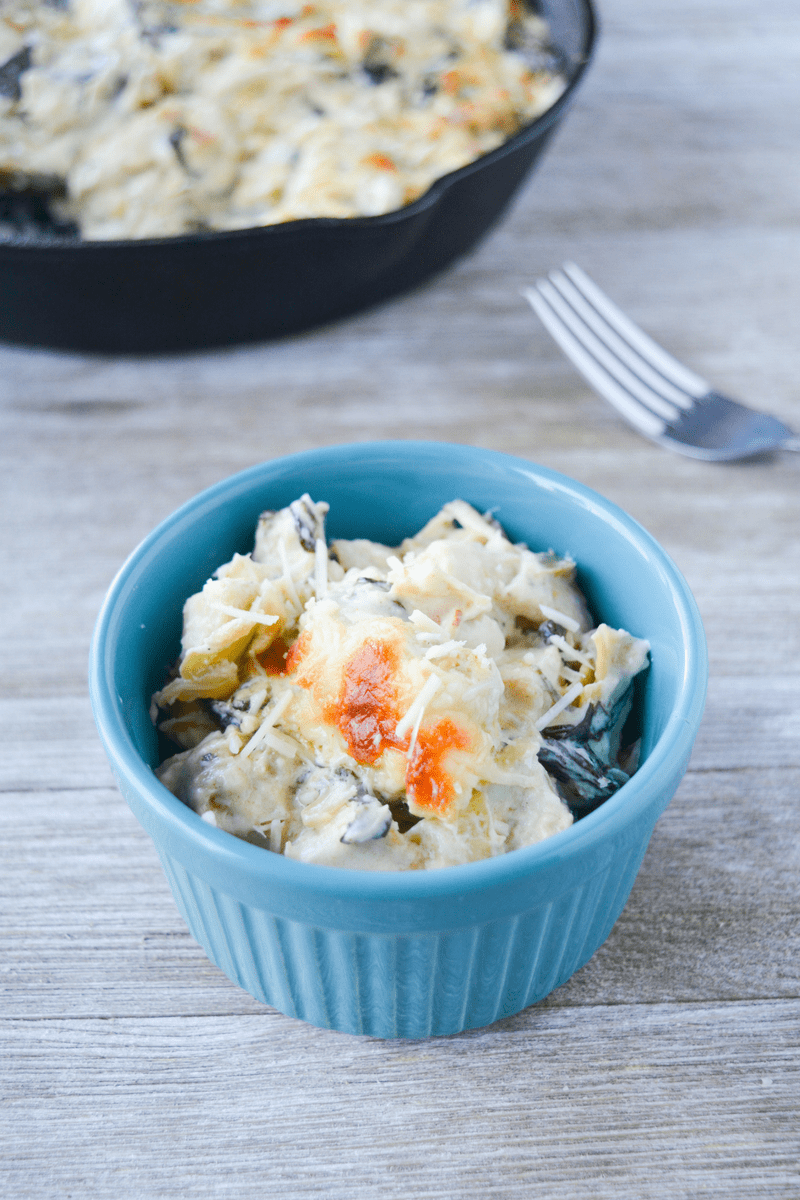 This Keto Spinach Artichoke Chicken Casserole is a rich and delightful meal your whole family will LOVE! This low carb recipe is a nice elevation of a classic appetizer. | heyketomama.com