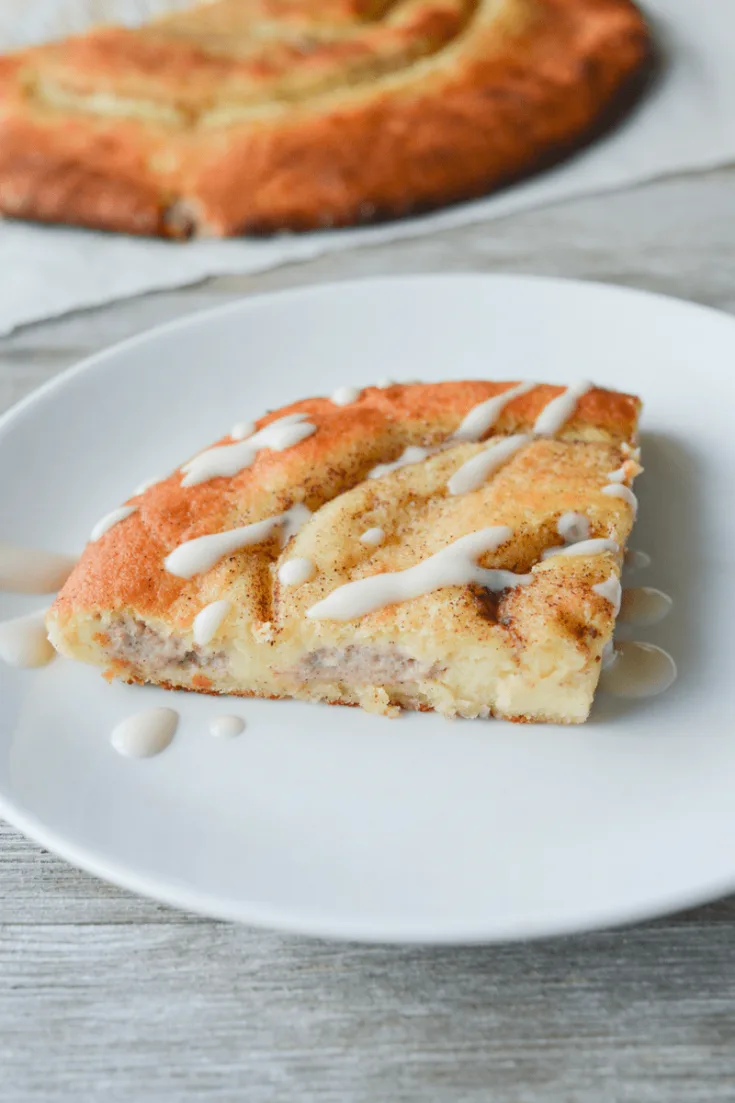 This Low Carb Stuffed Cinnamon Roll is an amazing treat that's very easy to make. It starts with the magical fathead dough base, and adds lots of yummy goodness! | heyketomama.com