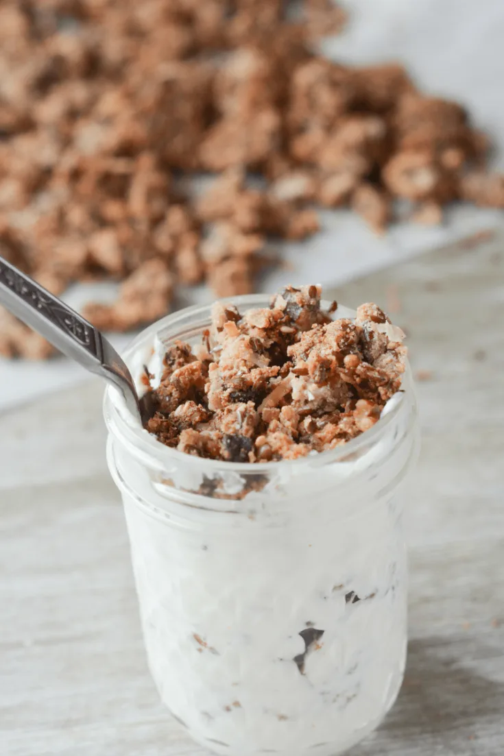 This Keto Cacao Coconut Granola is a delicious, low carb treat to satisfy your cravings for morning cereal, or just the perfect sweet and crunchy snack! | heyketomama.com