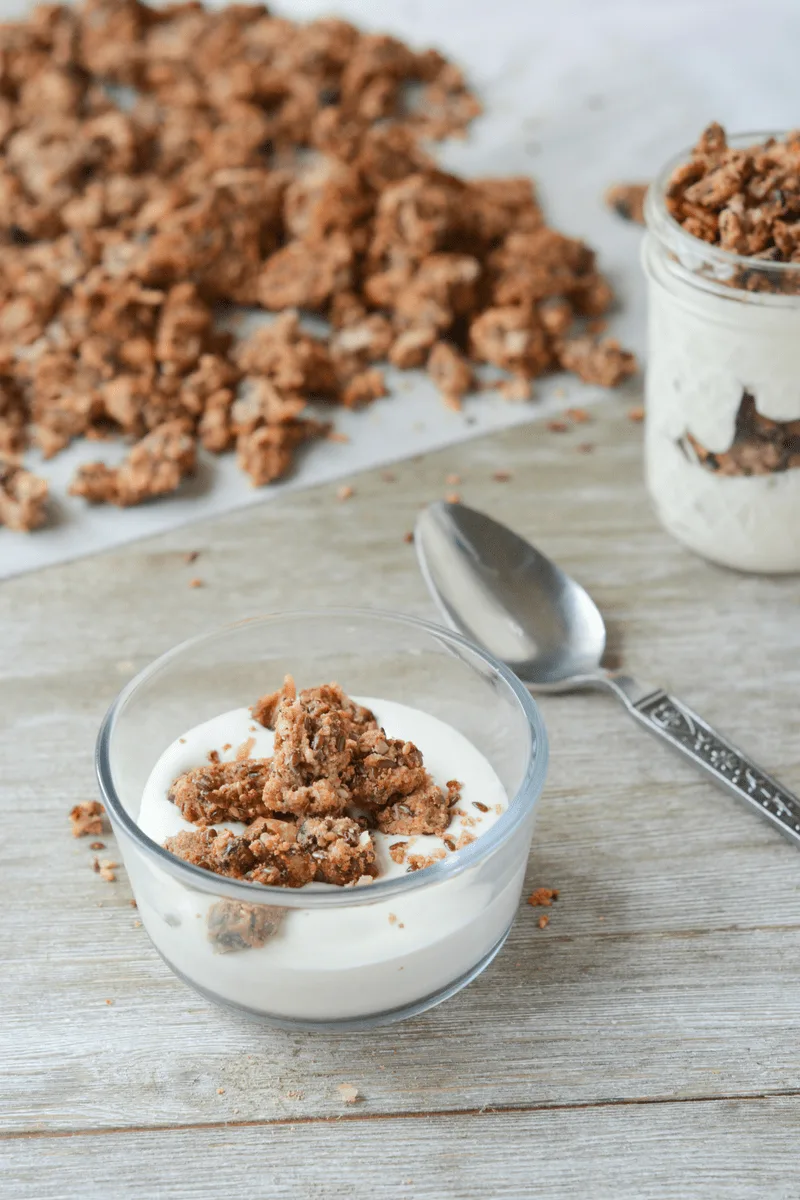 This Keto Cacao Coconut Granola is a delicious, low carb treat to satisfy your cravings for morning cereal, or just the perfect sweet and crunchy snack! | heyketomama.com