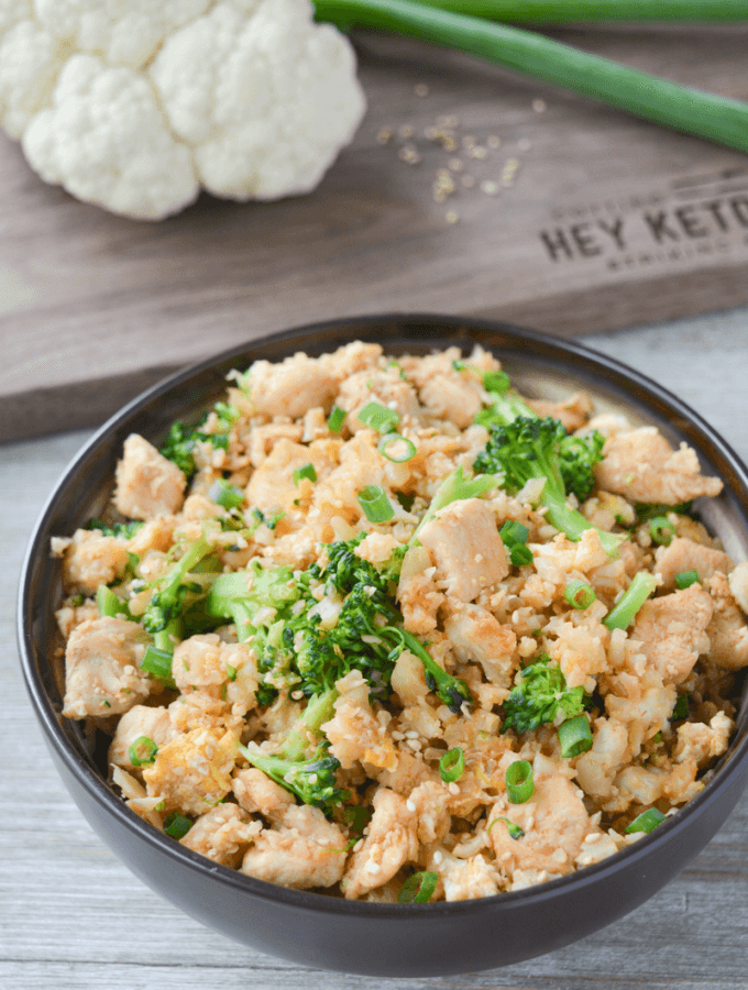 This Keto Chicken Fried Cauliflower Rice is a flavorful low carb side dish that could really be enjoyed as a meal! If you’ve been Chinese food, this recipe is a must try! | heyketomama.com