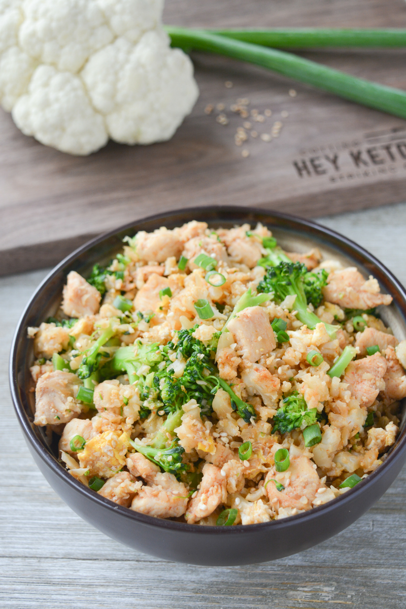 This Keto Chicken Fried Cauliflower Rice is a flavorful low carb side dish that could really be enjoyed as a meal! If you’ve been Chinese food, this recipe is a must try! | heyketomama.com