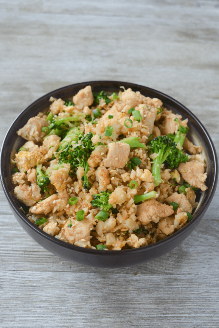 This Keto Chicken Fried Cauliflower Rice is a flavorful low carb side dish that could really be enjoyed as a meal! If you’ve been Chinese food, this recipe is a must try! | heyketomama.com