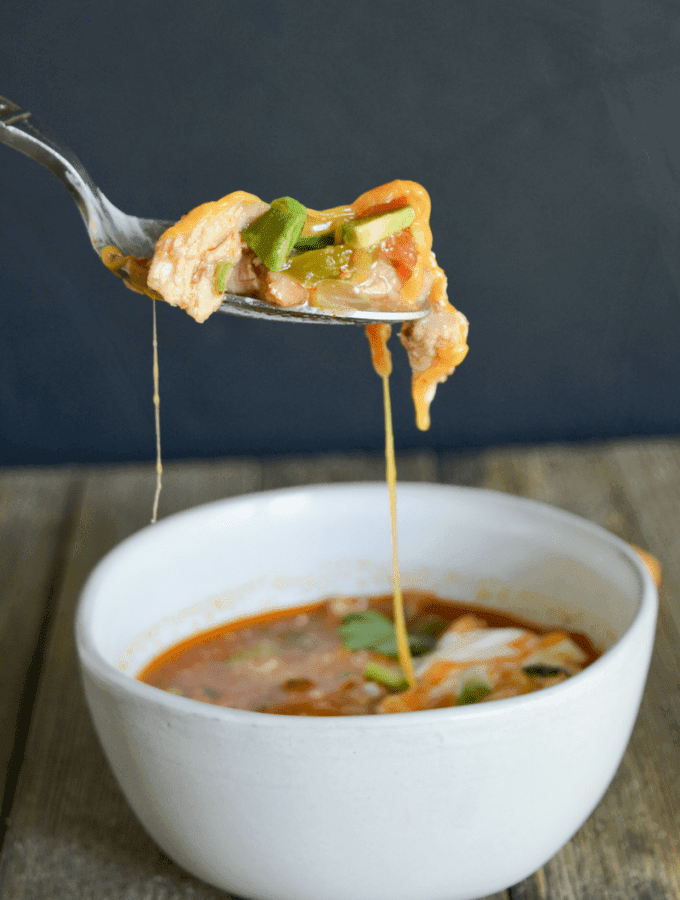This Keto Chicken Taco Soup is your answer when the colder months ask what delicious dish you'll be warming yourself up with! It's easy, delicious, and full of low carb goodness!