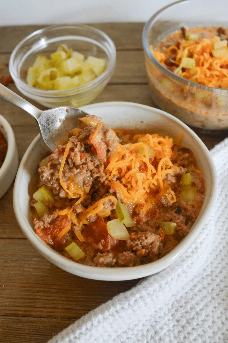 This Keto Bacon Cheeseburger Soup will be a weekly staple in your house, especially in the colder months! This burger that you slurp from a spoon is comforting, cheesy, and doesn't miss a single flavor from the classic handheld version. | heyketomama.com