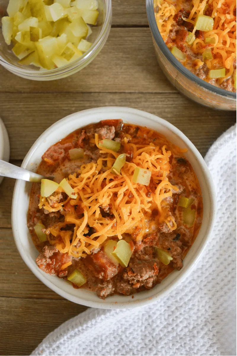 This Keto Bacon Cheeseburger Soup will be a weekly staple in your house, especially in the colder months! This burger that you slurp from a spoon is comforting, cheesy, and doesn't miss a single flavor from the classic handheld version. | heyketomama.com