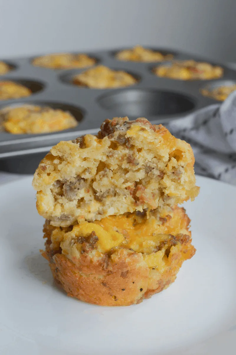 two stacked breakfast bombs with the top one sliced open to show the inside