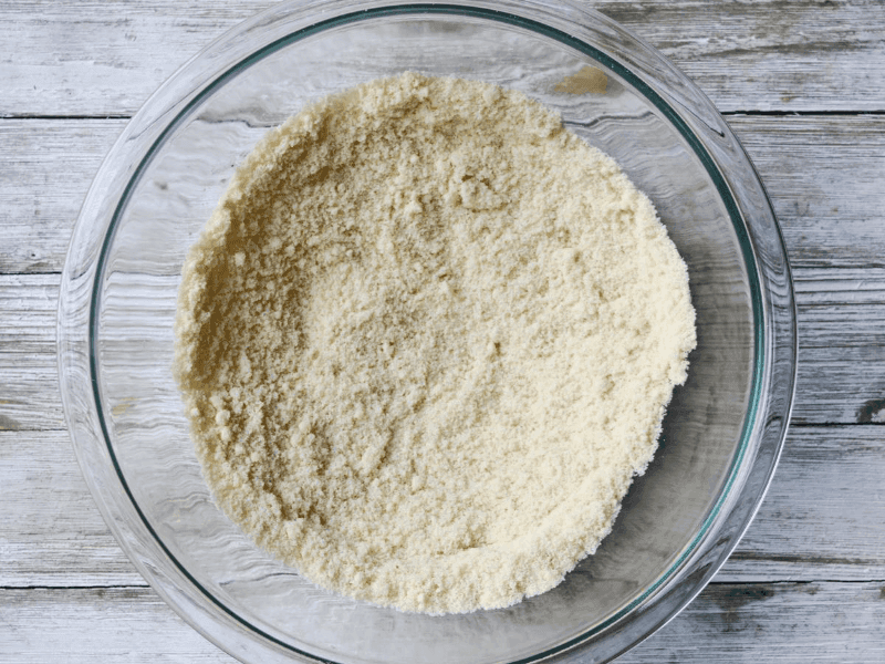 mixing bowl with almond flour and baking powder in it