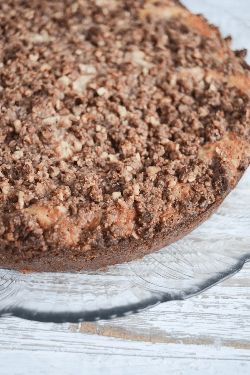 finished coffee cake sitting on a decorative glass plate