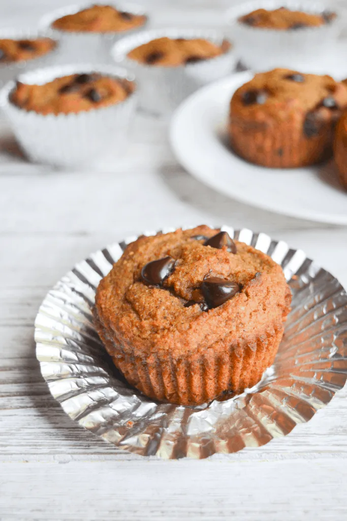 freshly unwrapped muffin showing sturdy outside texture from baking cups