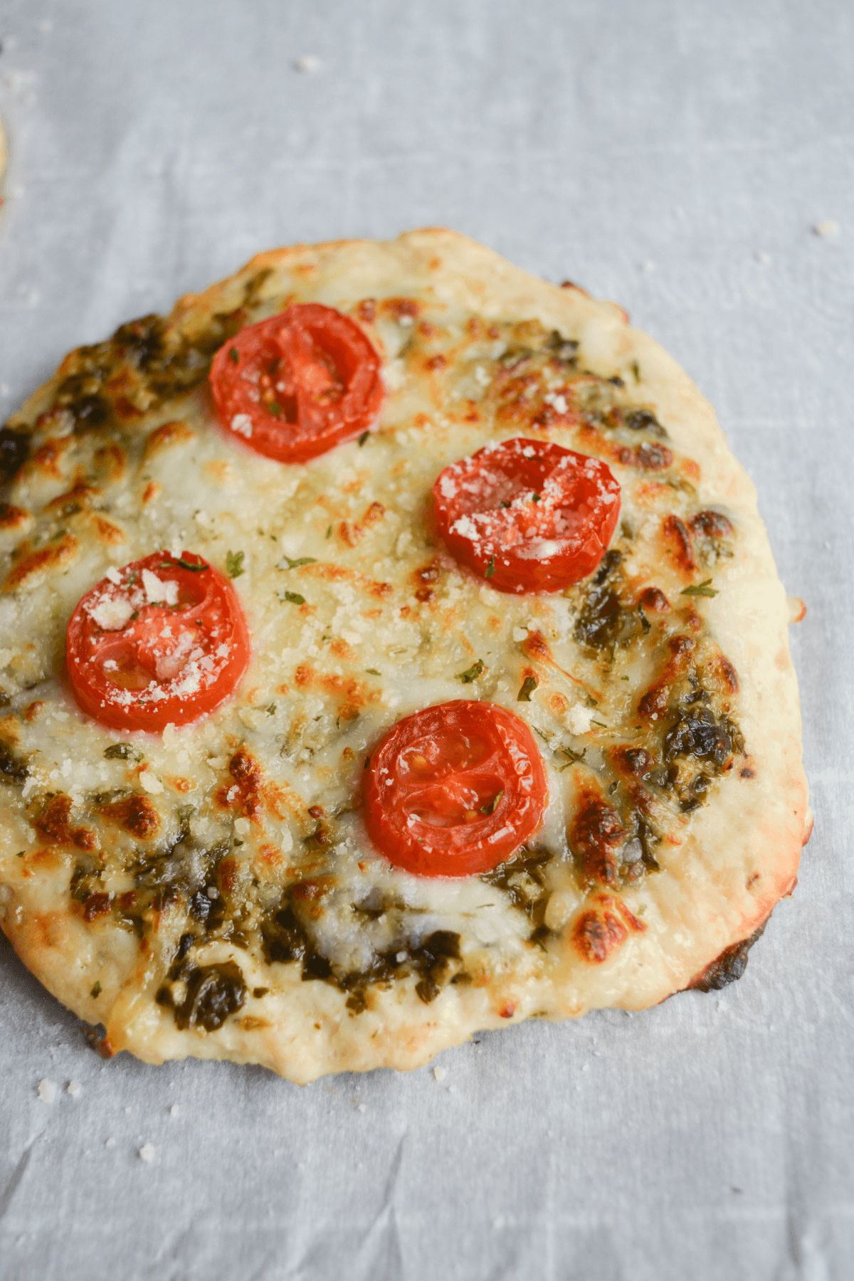 close up of keto chicken pesto pizza made in the air fryer