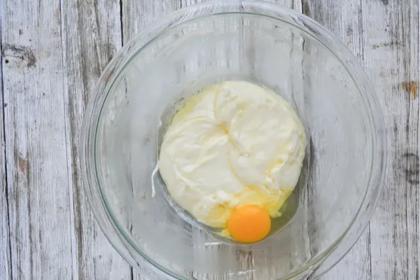 step two of making keto friendly fathead dough: adding the egg