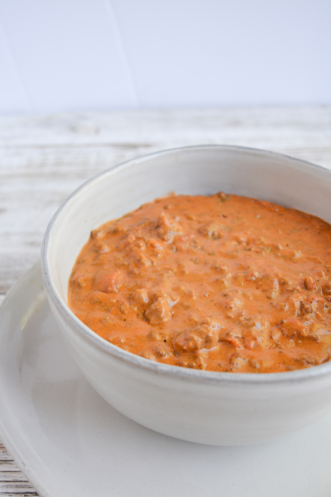 close up on bowl of low carb chili cheese dip