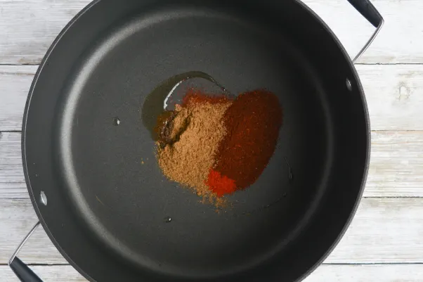 step three for cooking low carb chili: toasting the spices 