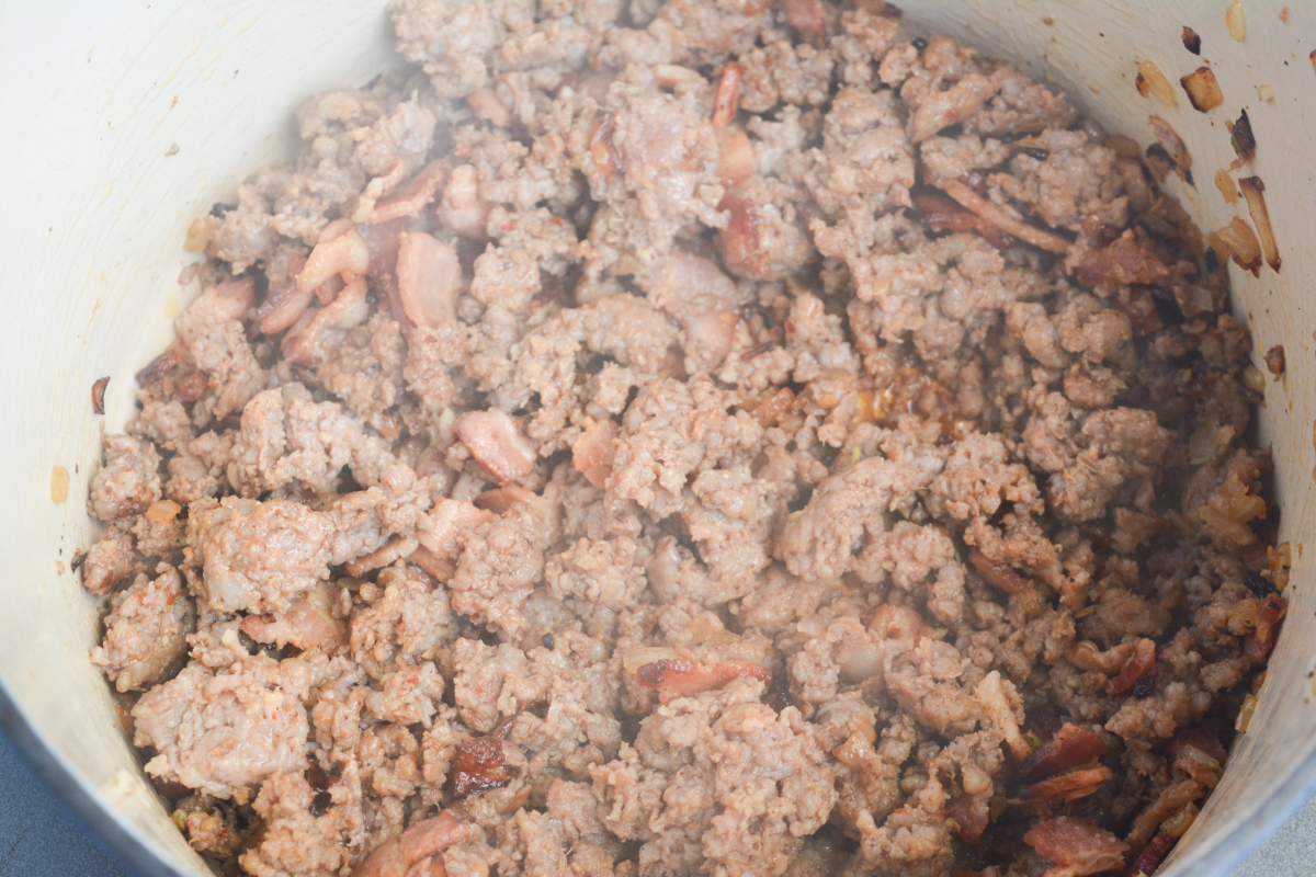 browned and crumbled Italian sausage in a large pot.