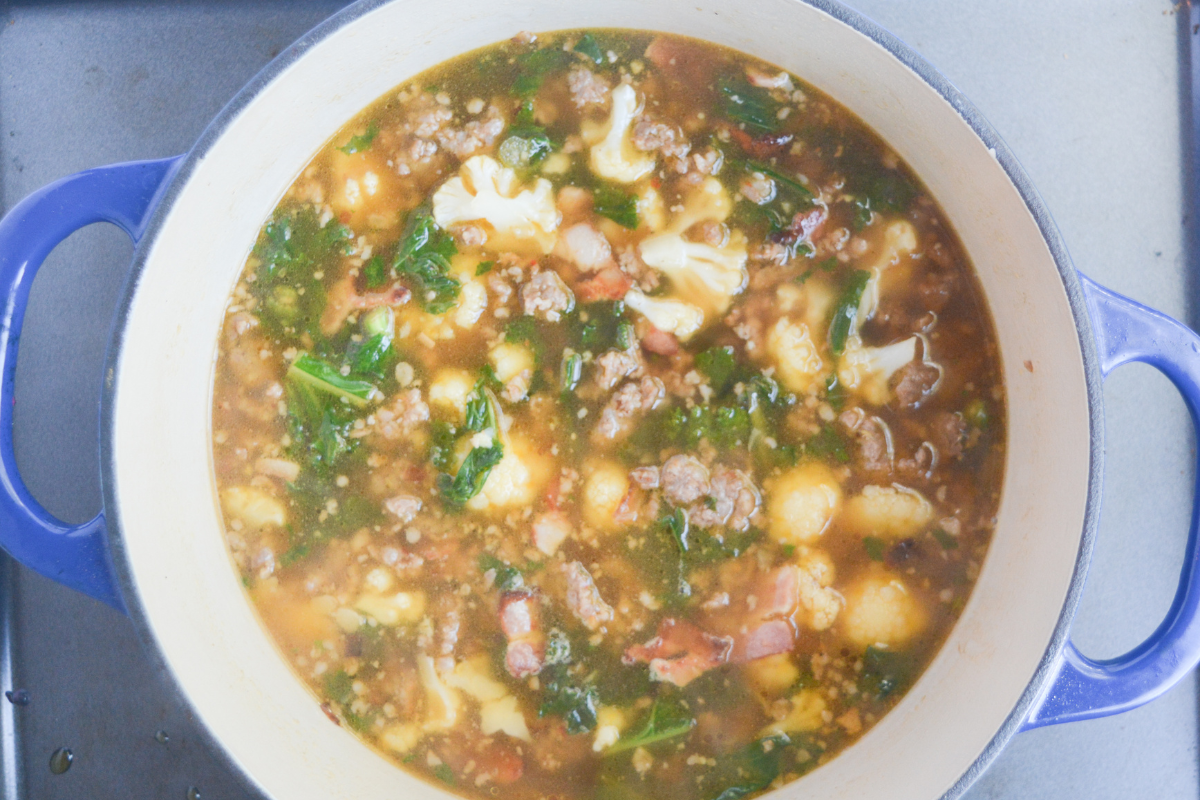 keto zuppa toscana ingredients in a large pot.